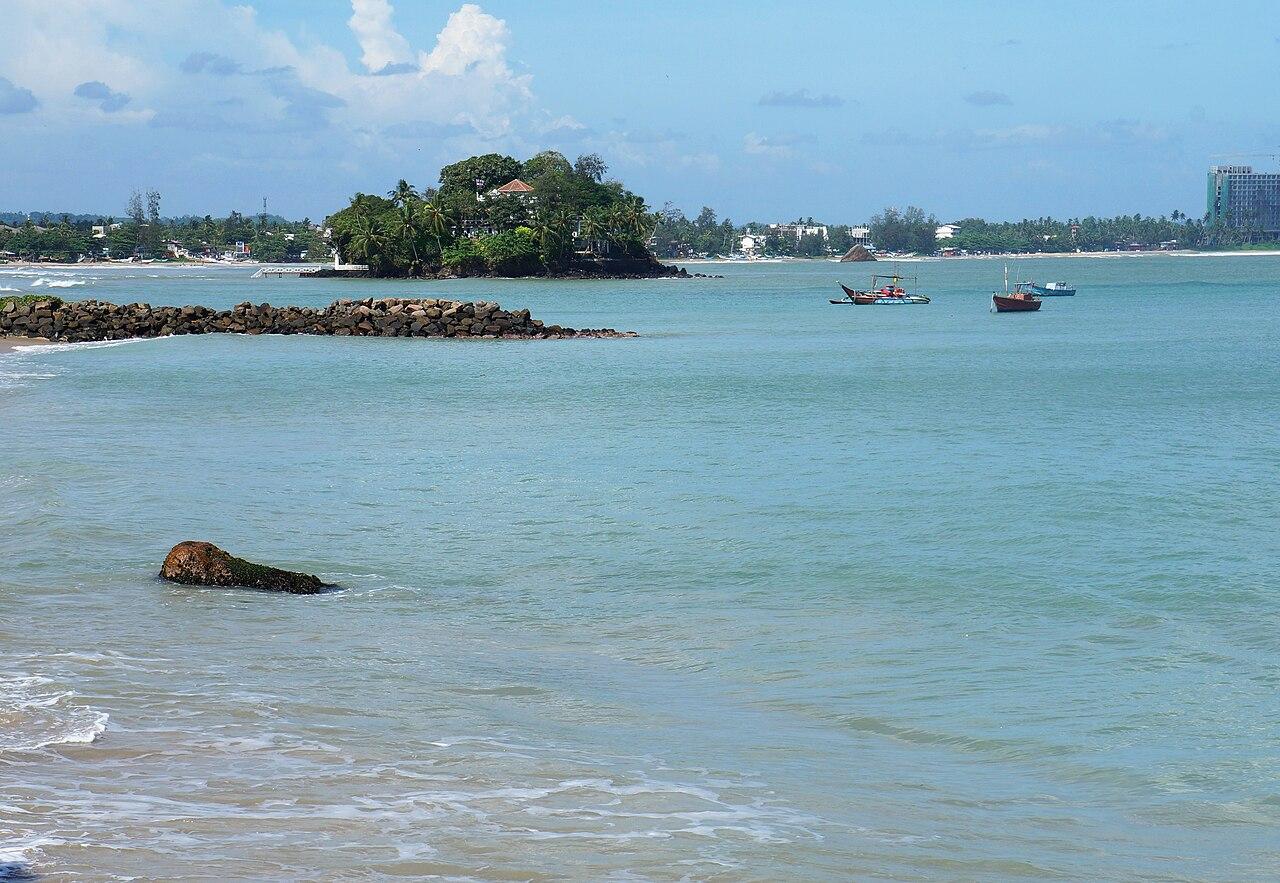 Weligama beach, Sri Lanka — real area photograph, not camp accommodation