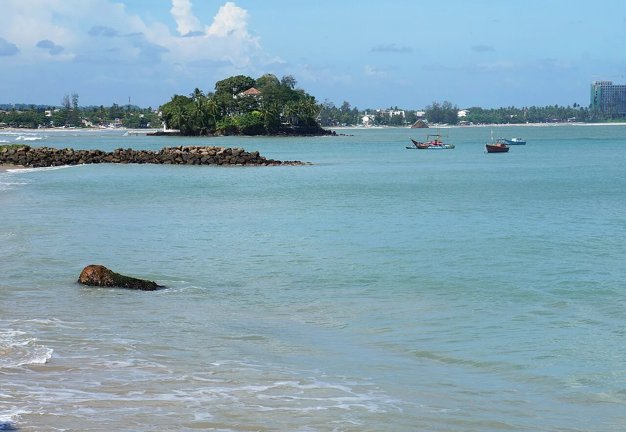 Weligama beach, Sri Lanka — real area photograph, not camp accommodation